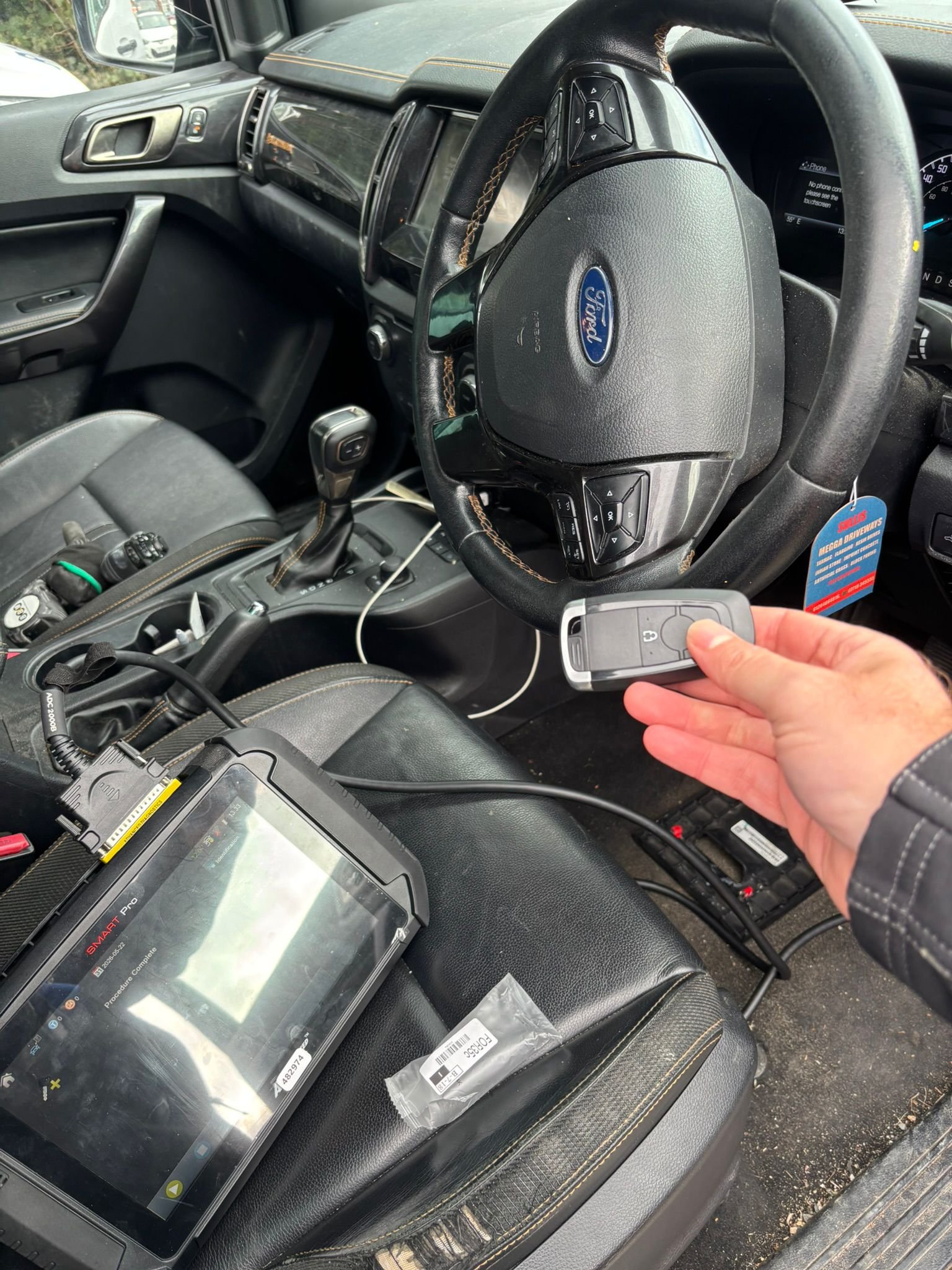 Auto locksmith at work
